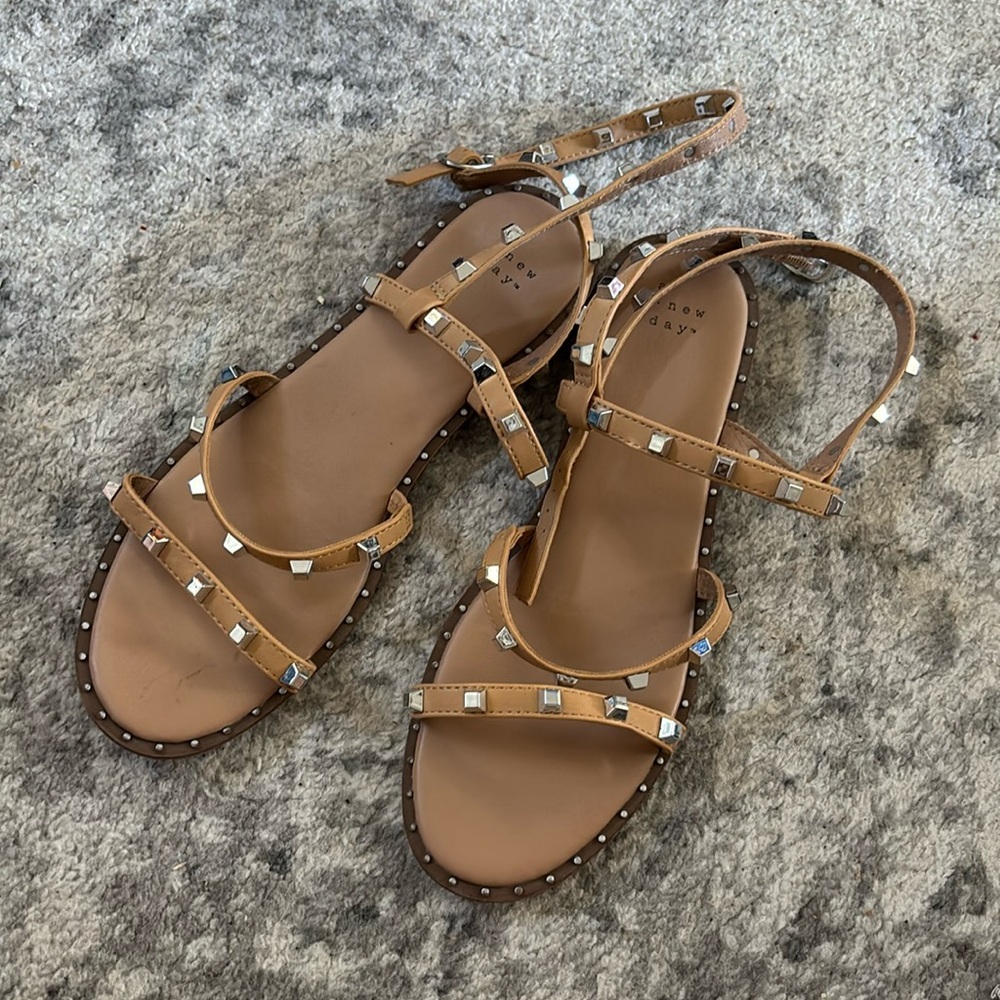 Tan sandals with straps that have square studs!